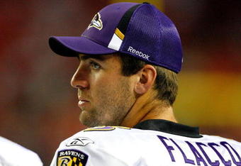 ATLANTA - SEPTEMBER 03:  Quarterback Joe Flacco #5 of the Baltimore Raves watches from the sidelines against the Atlanta Falcons at Georgia Dome on September 3, 2009 in Atlanta, Georgia.  (Photo by Kevin C. Cox/Getty Images)
