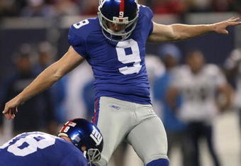 EAST RUTHERFORD, NJ - NOVEMBER 8: Lawrence Tynes #9 of the New York Giants kicks the ball against the San Diego Chargers at Giants Stadium on November 8, 2009 in East Rutherford, New Jersey. The Chargers defeated the Giants 21-20.  (Photo by Nick Laham/Getty Images)