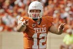 AUSTIN, TX - NOVEMBER 07:  Quarterback Colt McCoy #12 of the Texas Longhorns calls out the defense against the UCF Knights on November 7, 2009 at Darrell K Royal - Texas Memorial Stadium in Austin, Texas.  Texas won 35-3.  (Photo by Brian Bahr/Getty Images)