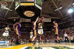 SEATTLE - FEBRUARY 24:  Mickael Gelabale #15 of the Seattle SuperSonics looks to pass over Coby Karl #11 of the Los Angeles Lakers during the game on February 24, 2008 at Key Arena in Seattle, Washington.  The Lakers won 111-91.  NOTE TO USER: User expressly acknowledges and agrees that, by downloading and/or using this Photograph, user is consenting to the terms and conditions of the Getty Images License Agreement. (Photo by Otto Greule Jr/Getty Images)