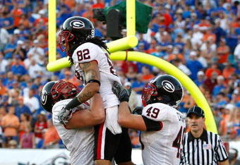 JACKSONVILLE, FL - OCTOBER 31:  Michael Moore #82 of the Georgia Bulldogs celebrates his touchdown against the Florida Gators at Jacksonville Municipal Stadium on October 31, 2009 in Jacksonville, Florida.  (Photo by Kevin C. Cox/Getty Images)
