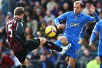 PORTSMOUTH, UNITED KINGDOM - FEBRUARY 14:  Angelos Basinas (R) of Portsmouth competes for the ball with Pablo Zabaleta (L) of Manchester City during the Barclays Premier League match between Portsmouth and Manchester City at Fratton Park on February 14, 2009 in London, England.  (Photo by Phil Cole/Getty Images)