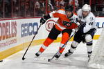 PHILADELPHIA - NOVEMBER 02:  James van Riemsdyk #21 of the Philadelphia Flyers skates against Andrej Meszaros #14 of the Tampa Bay Lightning on November 2, 2009 at Wachovia Center in Philadelphia, Pennsylvania.  (Photo by Jim McIsaac/Getty Images)