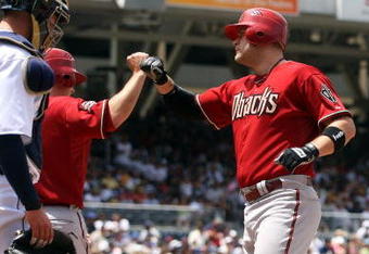 SAN DIEGO - APRIL 27:  Chris Snyder #19 of the Arizona Diamondbacks is congratulated by teammates  as catcher Josh Bard #28 of the san Diego Padres looks on after Snyder's homerun against the San Diego Padres during the MLB game on April 27, 2008 at Petco Park in San Diego, California.  (Photo by Donald Miralle/Getty Images)