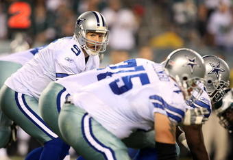 PHILADELPHIA - NOVEMBER 08:  Quarterback Tony Romo #9 of the Dallas Cowboys stands under center against the Philadelphia Eagles at Lincoln Financial Field on November 8, 2009 in Philadelphia, Pennsylvania. The Cowboys won 20-16.  (Photo by Al Bello/Getty Images)