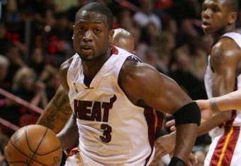 MIAMI - MAY 01:  Dwyane Wade #3 of the Miami Heat penetrates against the Atlanta Hawks during Game Six of the Eastern Conference Quarterfinals at American Airlines Arena on May 1, 2009 in Miami, Florida. NOTE TO USER: User expressly acknowledges and agrees that, by downloading and/or using this Photograph, user is consenting to the terms and conditions of the Getty Images License Agreement.  (Photo by Doug Benc/Getty Images)