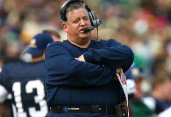 SOUTH BEND, IN - OCTOBER 03: Head coach Charlie Weis of the Notre Dame Fighting Irish watches as his team takes on the Washington Huskies on October 3, 2009 at Notre Dame Stadium in South Bend, Indiana.  Notre Dame defeated Washington 37-30 in overtime.  (Photo by Jonathan Daniel/Getty Images)