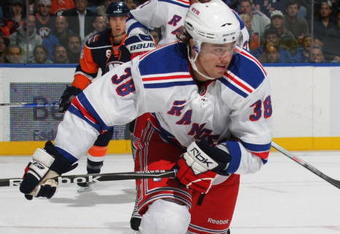 UNIONDALE, NY - OCTOBER 28:  P.A. Parenteau #38 of the New York Rangers skates against the New York Islanders at the Nassau Coliseum on October 28, 2009 in Uniondale, New York.  (Photo by Bruce Bennett/Getty Images)