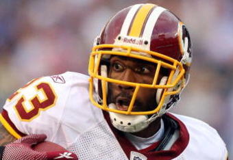 EAST RUTHERFORD, NJ - SEPTEMBER 13:  DeAngelo Hall #23 of the Washington Redskins runs the ball after an interception against the New York Giants on September 13, 2009 at Giants Stadium in East Rutherford, New Jersey.  (Photo by Jim McIsaac/Getty Images)