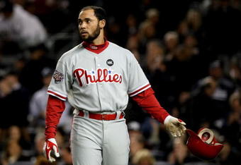 NEW YORK - NOVEMBER 04:  Pedro Feliz #7 of the Philadelphia Phillies reacts after he flied out for the third out of the top of the second inning against the New York Yankees in Game Six of the 2009 MLB World Series at Yankee Stadium on November 4, 2009 in the Bronx borough of New York City.  (Photo by Nick Laham/Getty Images)