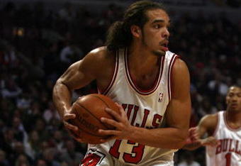 CHICAGO - NOVEMBER 03: Joakim Noah #13 of the Chicago Bulls looks to pass after grabbing a rebound against the Milwaukee Bucks at the United Center on November 3, 2009 in Chicago, Illinois. The Bulls defeated the Bucks 83-81. (Photo by Jonathan Daniel/Getty Images)