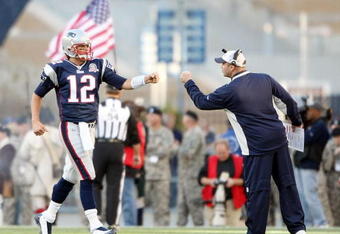 FOXBORO, MA - NOVEMBER 08:  Tom Brady #12 of the New England Patriots celebrates after the two point conversion in the second half against the Miami Dolphin on November 8, 2009 at Gillette Stadium in Foxboro, Massachusetts. The Patriots defeated the Dolphins 27-17.  (Photo by Elsa/Getty Images)
