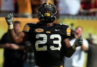 TAMPA, FL - JANUARY 01:  Shonn Green #23 of the Iowa Hawkeyes celebrates a touchdown run against the South Carolina Gamecocks during the Outback Bowl on January 1, 2009 at Raymond James Stadium in Tampa, Florida.  (Photo by Scott Halleran/Getty Images)