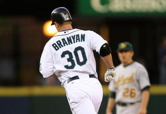 SEATTLE - AUGUST 25:  Russell Branyan #30 of the Seattle Mariners rounds the bases after hitting a solo homer against the Oakland Athletics on August 25, 2009 at Safeco Field in Seattle, Washington. (Photo by Otto Greule Jr/Getty Images)