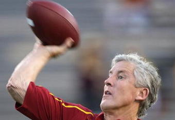 TEMPE, AZ - NOVEMBER 07:  Head coach Pete Carroll of the USC Trojans throws a football before the college football game against the Arizona State Sun Devils at Sun Devil Stadium on November 7, 2009 in Tempe, Arizona.  The Trojans defeated the Devils 14-9.  (Photo by Christian Petersen/Getty Images)