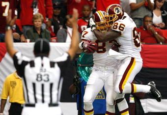 ATLANTA - NOVEMBER 08:  Todd Yoder #87 of the Washington Redskins celebrates his touchdown against the Atlanta Falcons with Fred Davis #86 at Georgia Dome on November 8, 2009 in Atlanta, Georgia.  (Photo by Kevin C. Cox/Getty Images)