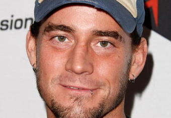 LOS ANGELES, CA - APRIL 07:  Wrestler CM Punk arrives at the 1st Annual Epiphone Revolver Golden Gods Awards at the Club Nokia on April 7, 2009 in Los Angeles, California.  (Photo by Michael Buckner/Getty Images)