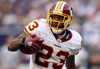 EAST RUTHERFORD, NJ - SEPTEMBER 13:  DeAngelo Hall #23 of the Washington Redskins runs the ball after an interception against the New York Giants on September 13, 2009 at Giants Stadium in East Rutherford, New Jersey.  (Photo by Jim McIsaac/Getty Images)