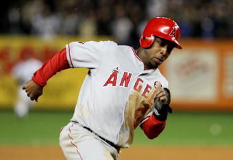 NEW YORK - OCTOBER 25:  Chone Figgins #9 of the Los Angeles Angels of Anaheim rounds third base to score in the top of the eighth inning against the New York Yankees in Game Six of the ALCS during the 2009 MLB Playoffs at Yankee Stadium on October 25, 2009 in the Bronx borough of New York City.  (Photo by Nick Laham/Getty Images)