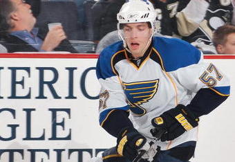 PITTSBURGH - OCTOBER 20:  Left wing David Perron #57 of the St. Louis Blues skates with the puck against the Pittsburgh Penguins on October 20, 2009 at Mellon Arena in Pittsburgh, Pennsylvania.  (Photo by Jamie Sabau/Getty Images)