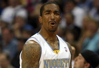 DENVER - MAY 29:  J.R. Smith #1 of the Denver Nuggets reacts against the Los Angeles Lakers in Game Six of the Western Conference Finals during the 2009 NBA Playoffs at Pepsi Center on May 29, 2009 in Denver, Colorado. NOTE TO USER: User expressly acknowledges and agrees that, by downloading and or using this photograph, User is consenting to the terms and conditions of the Getty Images License Agreement.  (Photo by Jed Jacobsohn/Getty Images)