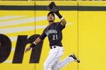 SEATTLE - SEPTEMBER 18: Franklin Gutierrez #21 of the Seattle Mariners runs back to catch the fly ball during the game against the New York Yankees on September 18, 2009 at Safeco Field in Seattle, Washington. (Photo by Otto Greule Jr/Getty Images)