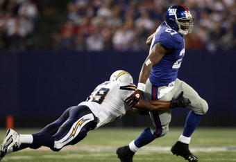 EAST RUTHERFORD, NJ - NOVEMBER 8:  Brandon Jacobs #27 of the New York Giants runs the ball against the San Diego Chargers at Giants Stadium on November 8, 2009 in East Rutherford, New Jersey. The Chargers defeated the Giants 21-20.  (Photo by Nick Laham/Getty Images)