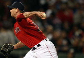 BOSTON - OCTOBER 02:  Billy Wagner #13 of the Boston Red Sox delivers a pitch against the Cleveland Indians on October 2, 2009 at Fenway Park in Boston, Massachusetts.  (Photo by Elsa/Getty Images)