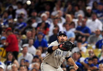 LOS ANGELES, CA - SEPTEMBER 04:  Adrian Gonzalez #23 of the San Diego Padres catches a ball at first against the Los Angeles Dodgers on September 4, 2009 at Dodger Stadium in Los Angeles, California. (Photo by Jacob de Golish/Getty Images)