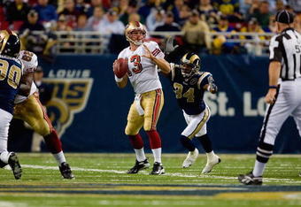 ST. LOUIS, MO - DECEMBER 21:  Fakhir Brown #34 of the St. Louis Rams bears down upon an unsuspecting Shaun Hill #13 of the San Francisco 49ers during the game at the Edward Jones Dome on December 21, 2008 in St. Louis, Missouri. The 49ers won 17-16. (Photo by Dilip Vishwanat/Getty Images) 