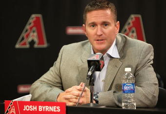 PHOENIX - MAY 08:  General manager Josh Byrnes of the Arizona Diamondbacks introduces the new team manager A. J. Hinch (not pictured) during a press conference before the game against the Washington Nationals at Chase Field on May 8, 2009 in Phoenix, Arizona.  (Photo by Christian Petersen/Getty Images)
