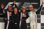 ABU DHABI, UNITED ARAB EMIRATES - NOVEMBER 01:  (L-R) Second placed Mark Webber of Australia and Red Bull Racing, Red Bull Racing Team Principal Christian Horner, race winner Sebastian Vettel of Germany and Red Bull Racing and third placed Jenson Button of Great Britain and Brawn GP celebrate on the podium following the Abu Dhabi Formula One Grand Prix at the Yas Marina Circuit on November 1, 2009 in Abu Dhabi, United Arab Emirates.  (Photo by Mark Thompson/Getty Images)