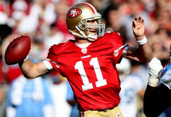 SAN FRANCISCO - NOVEMBER 08:  Alex Smith #11 of the San Francisco 49ers passes against the Tennessee Titans during an NFL game on November 8, 2009 at Candlestick Park in San Francisco, California.  (Photo by Jed Jacobsohn/Getty Images)