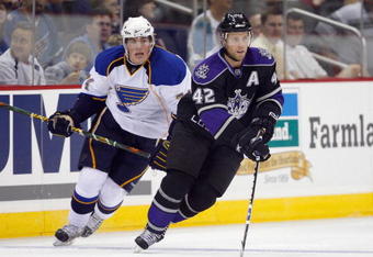 KANSAS CITY, MO - SEPTEMBER 22:  Tom Preissing #42 of the Los Angeles Kings moves the puck through the neutral zone during a preseason game against the St. Louis Blues on September 22, 2008 at the Sprint Center in Kansas City, Missouri. The Kings defeated the Blues 2-1. (Photo by Jamie Squire/Getty Images)