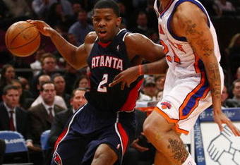 NEW YORK - MARCH 04:  Joe Johnson #2 of the Atlanta Hawks goes up against Wilson Chandler #21 of the New York Knicks at Madison Square Garden March 4, 2009 in New York City. NOTE TO USER: User expressly acknowledges and agrees that, by downloading and/or using this Photograph, User is consenting to the terms and conditions of the Getty Images License Agreement.  (Photo by Chris McGrath/Getty Images)