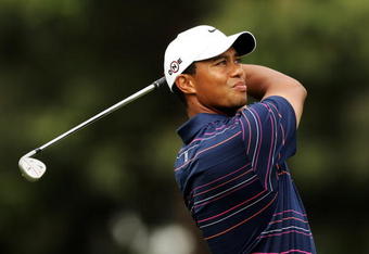 MELBOURNE, AUSTRALIA - NOVEMBER 12:  Tiger Woods of the USA plays an approach shot on the 18th hole during round one of the 2009 Australian Masters at Kingston Heath Golf Club on November 12, 2009 in Melbourne, Australia.  (Photo by Mark Dadswell/Getty Images)