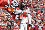 TAMPA, FL - OCTOBER 18:  Safeties Sabby Piscitelli #21 and Tanard Jackson #36 of the Tampa Bay Buccaneers celebrate Jackson's touchdown against the Carolina Panthers during the game at Raymond James Stadium on October 18, 2009 in Tampa, Florida.  (Photo by J. Meric/Getty Images)