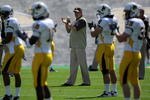 BOULDER, CO - SEPTEMBER 19:  Head coach Dave Christensen of the Wyoming Cowboys prepares to lead his team against the Colorado Buffaloes at Folsom Field on September 19, 2009 in Boulder, Colorado. The Buffaloes defeated the Cowboys 24-0.  (Photo by Doug Pensinger/Getty Images)