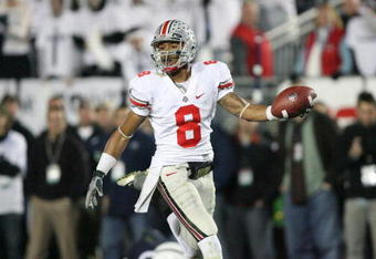STATE COLLEGE, PA - NOVEMBER 7: Wide receiver DeVier Posey #8 of the Ohio State Buckeyes scores a touchdown during a game against the Penn State Nittany Lions on November 7, 2009 at Beaver Stadium in State College, Pennsylvania. Ohio State won 24-7. (Photo by Hunter Martin/Getty Images)