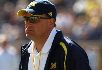 ANN ARBOR, MI - SEPTEMBER 19:  Head coach Rich Rodriguez of the Michigan Wolverines watches warmups before the game with the Eastern Michigan Eagles at Michigan Stadium on September 19, 2009 in Ann Arbor, Michigan.  Michigan won 45-17.  (Photo by Stephen Dunn/Getty Images)