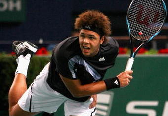 PARIS - NOVEMBER 10:  Jo-Wilfried Tsonga of France in action during his match against Albert Montanes of Spain during the ATP Masters Series at the Palais Omnisports De Paris-Bercy on November 10, 2009 in Paris, France.  (Photo by Clive Rose/Getty Images)