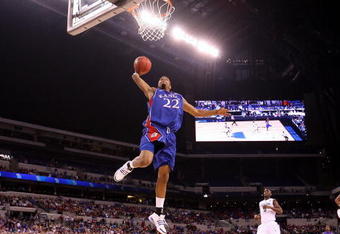 INDIANAPOLIS - MARCH 27:  Marcus Morris #22 of the Kansas Jayhawks drives for a dunk attempt against the Michigan State Spartans during the third round of the NCAA Division I Men's Basketball Tournament at the Lucas Oil Stadium on March 27, 2009 in Indianapolis, Indiana.  (Photo by Andy Lyons/Getty Images)
