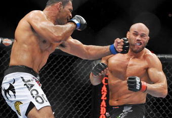 PORTLAND, OR - AUGUST 29:  UFC fighter Antonio Nogueira (L) battles UFC fighter Randy Couture (R) during their Heavyweight bout at UFC 102:  Couture vs. Nogueira at the Rose Garden Arena on August 29, 2009 in Portland, Oregon.  (Photo by Jon Kopaloff/Getty Images)