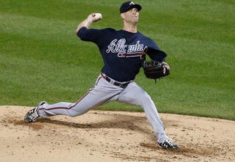 NEW YORK - SEPTEMBER 23:  Tim Hudson #15 of the Atlanta Braves pitches against the New York Mets during the game on September 23, 2009 at Citi Field in the Flushing neighborhood of the Queens borough of New York City.  (Photo by Jared Wickerham/Getty Images)
