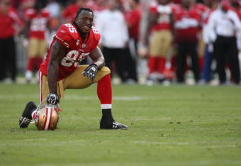 SAN FRANCISCO - NOVEMBER 08:  Vernon Davis #85 of the San Francisco 49ers looks on against the Tennessee Titans during an NFL game on November 8, 2009 at Candlestick Park in San Francisco, California.  (Photo by Jed Jacobsohn/Getty Images)