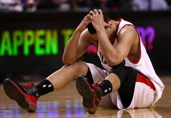PORTLAND, OR - APRIL 18:  Brandon Roy #7 of the Portland Trail Blazers holds his head after being injured during a scramble for the ball against  the Houston Rockets during Game One of the Western Conference Quarterfinals of the 2009 NBA Playoffs on April 18, 2009 at the Rose Garden in Portland, Oregon. NOTE TO USER: User expressly acknowledges and agrees that, by downloading and or using this Photograph, user is consenting to the terms and conditions of the Getty Images License Agreement.  (Photo by Jonathan Ferrey/Getty Images)