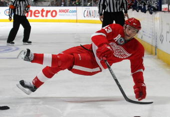 TORONTO, ON - NOVEMBER 07: Pavel Datsyuk #13 of the Detroit Red Wings is tripped up in his game against the Toronto Maple Leafs at the Air Canada Centre on November 7, 2009 in Toronto, Canada. The Maple Leafs defeated the Red Wings 5-1. (Photo by Bruce Bennett/Getty Images)