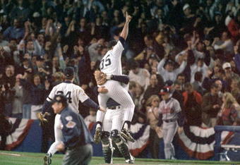 BRONX, NY - OCTOBER 26:  John Wetteland #35 of the New York Yankees celebrates the final out of Game six of the 1996 World Series against the Atlanta Braves at Yankee Stadium on October 26, 1996 in Bronx, New York. The Yankees defeated the Braves 3-2 to win the series four games to two. (Photo by Al Bello/Getty Images)