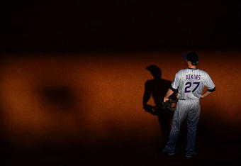 PHILADELPHIA - OCTOBER 08:  Garrett Atkins #27 of the Colorado Rockies stands in the field against the Philadelphia Phillies in Game Two of the NLDS during the 2009 MLB Playoffs at Citizens Bank Park on October 8, 2009 in Philadelphia, Pennsylvania. The Rockies won 5-4. (Photo by Chris McGrath/Getty Images)