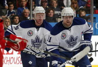 TORONTO, ON - NOVEMBER 07: (L-R) Jason Blake #55 and Phil Kessel #81 of the Toronto Maple Leafs skate against the Detroit Red Wings at the Air Canada Centre on November 7, 2009 in Toronto, Canada.  (Photo by Bruce Bennett/Getty Images)